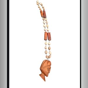 Handcrafted Wooden Beaded Necklace with Carved Pendant